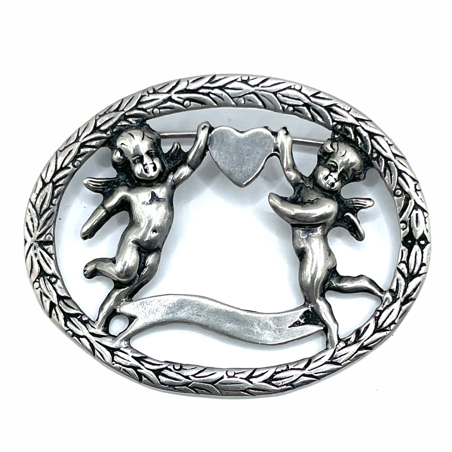 Art Nouveau sterling Cupid brooch