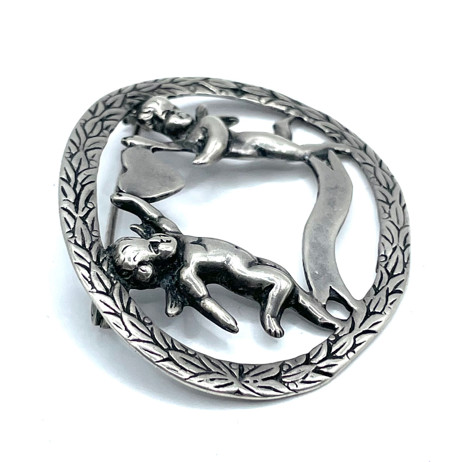 Art Nouveau sterling Cupid brooch