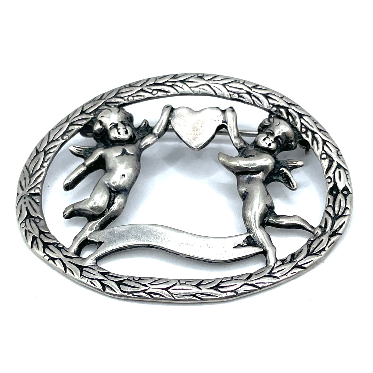 Art Nouveau sterling Cupid brooch