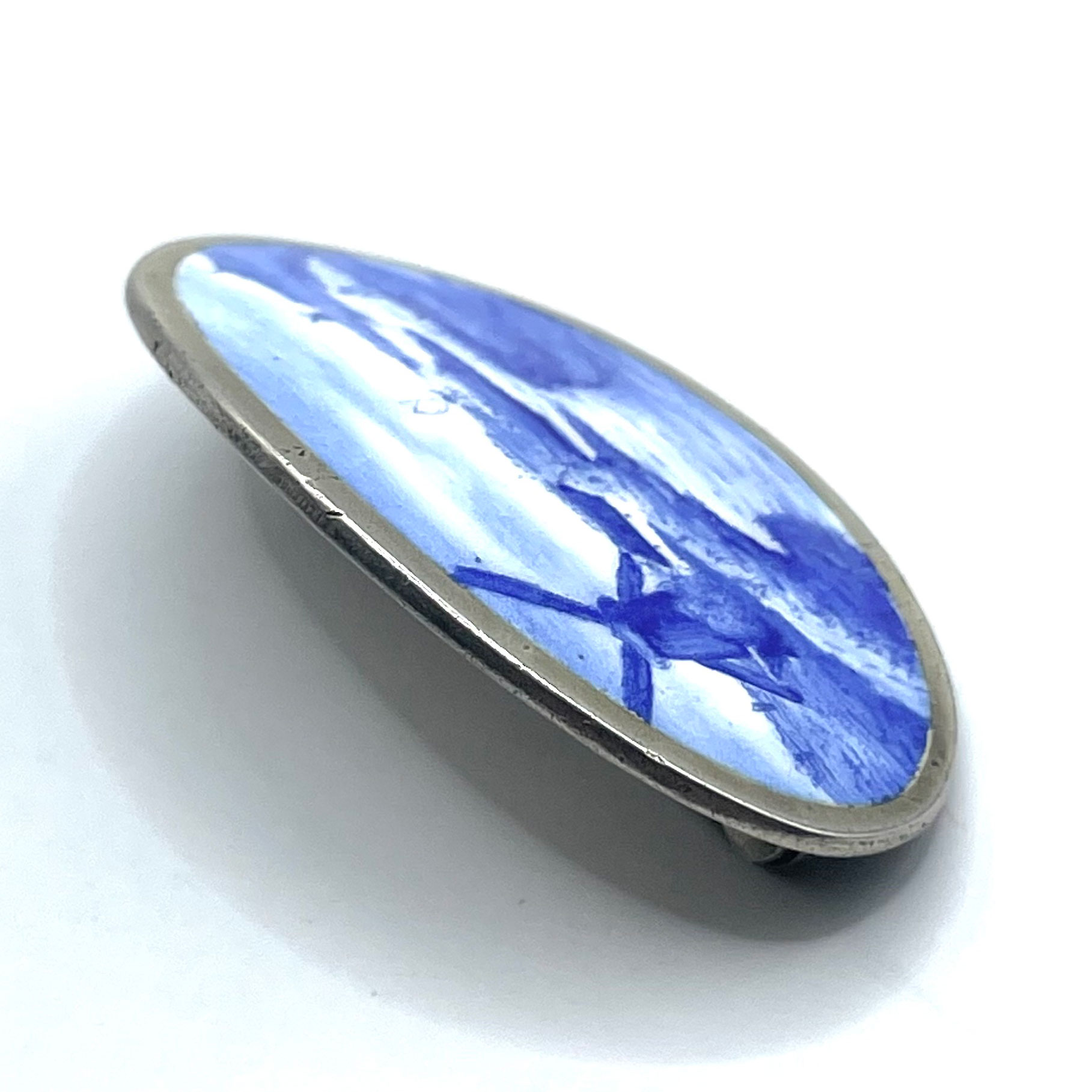 flow blue brooch